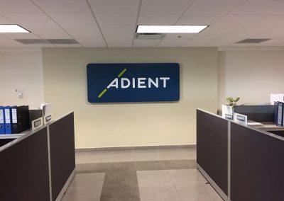 Adient interior plaques