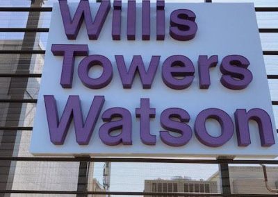 Willis Towers Watson mid-rise exterior sign closeup