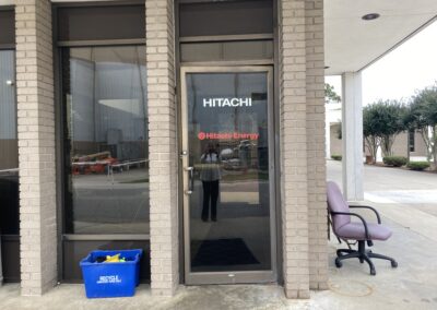 glass vinyl hitachi program global brand implementation TISA - exterior signage